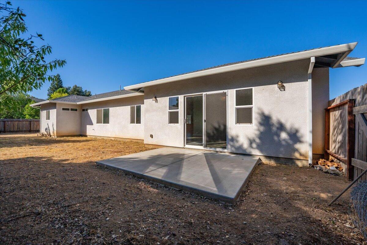 1565 Carl Court Red Bluff, CA 96080 - Photo 41 of 49 a view of a house with backyard and porch