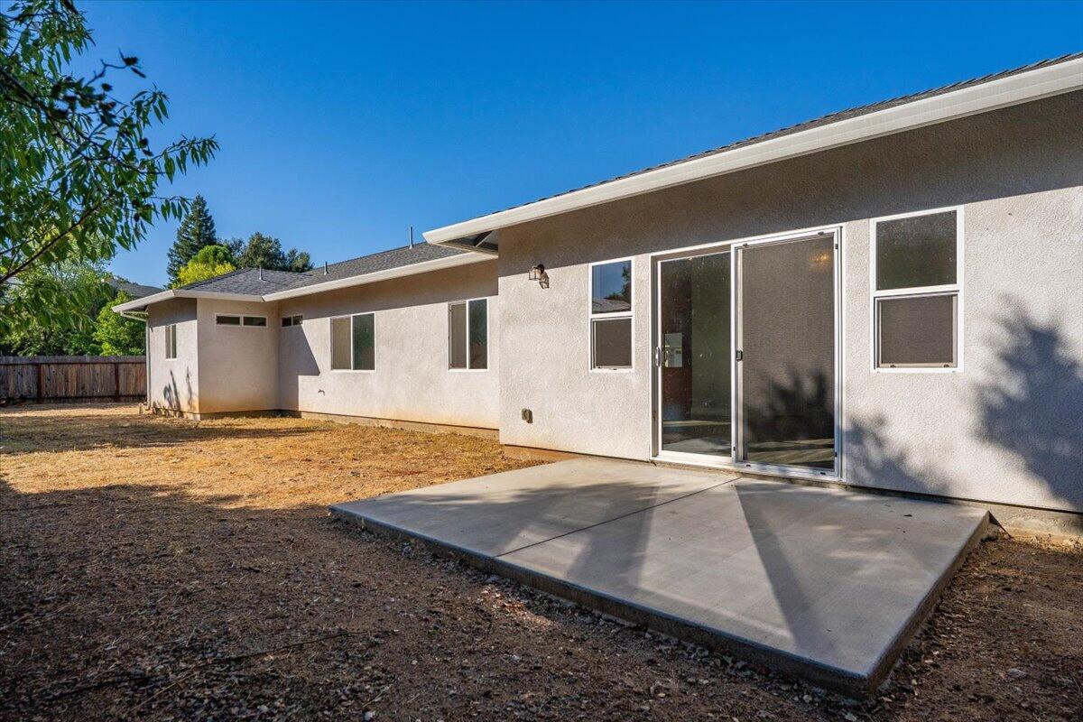1565 Carl Court Red Bluff, CA 96080 - Photo 42 of 49 a front view of a house with a yard