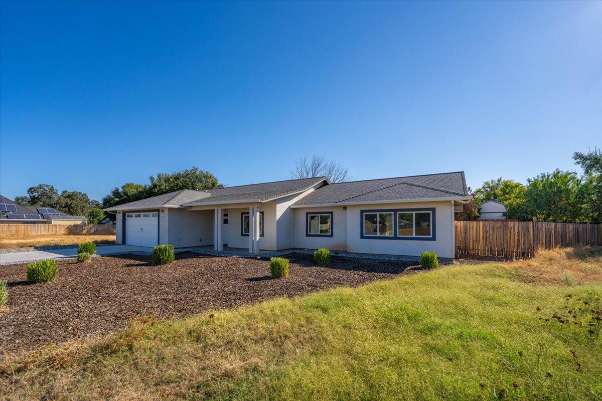 1565 Carl Court Red Bluff, CA 96080 - Photo 49 of 49 a house view with a garden space