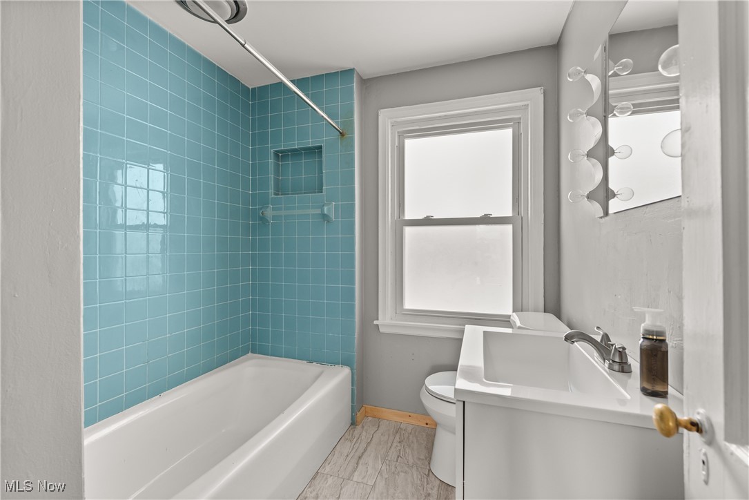 4041 Wilmington Road Cleveland, OH 44121 - Photo 23 of 38 Full bath featuring vanity and shower combination