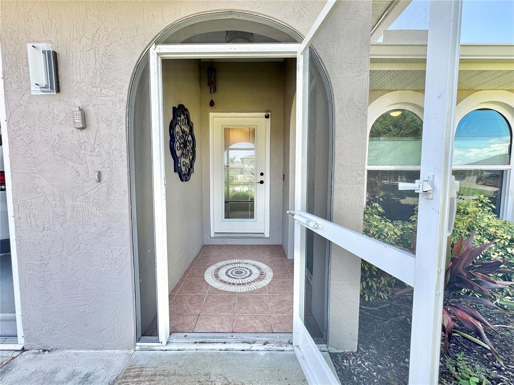 9405 Spring Circle Port Charlotte, FL 33981 - Photo 3 of 24 a view of door