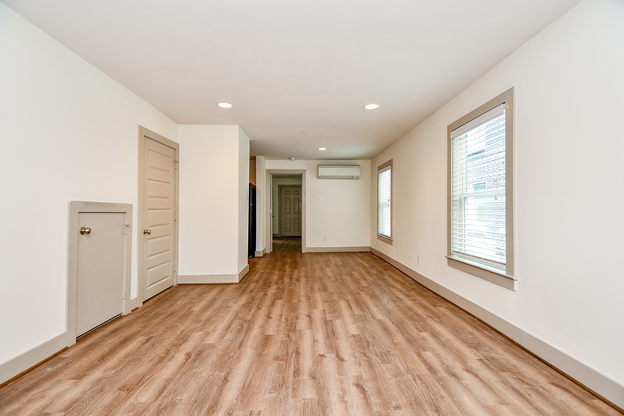 a view of an empty room and window