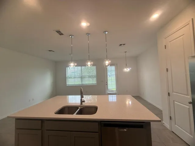 an empty room with a bathroom