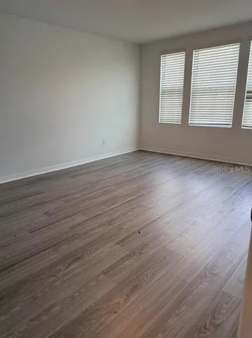 a bathroom with a sink double vanity and a mirror