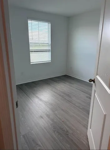 a bathroom with a sink a toilet and a shower