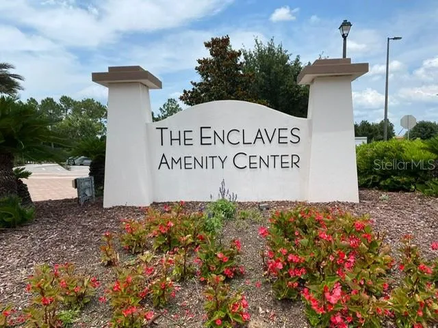 an aerial view of a house with yard swimming pool and outdoor seating