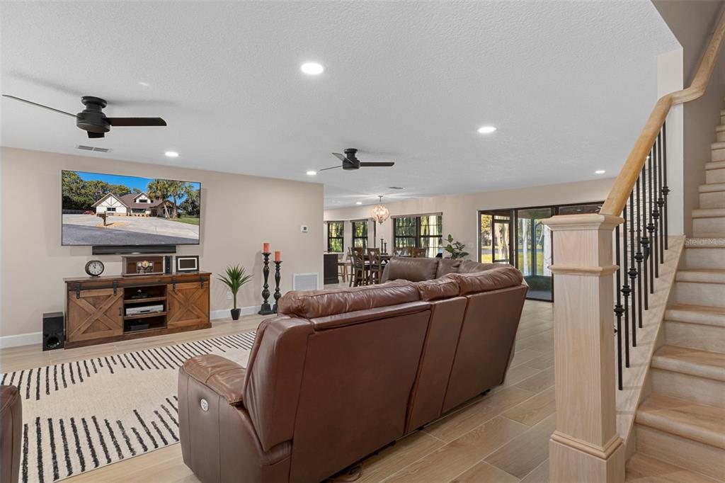 1425 South Homestead Point Inverness, FL 34450 - Photo 11 of 72 a living room with furniture and a wooden floor