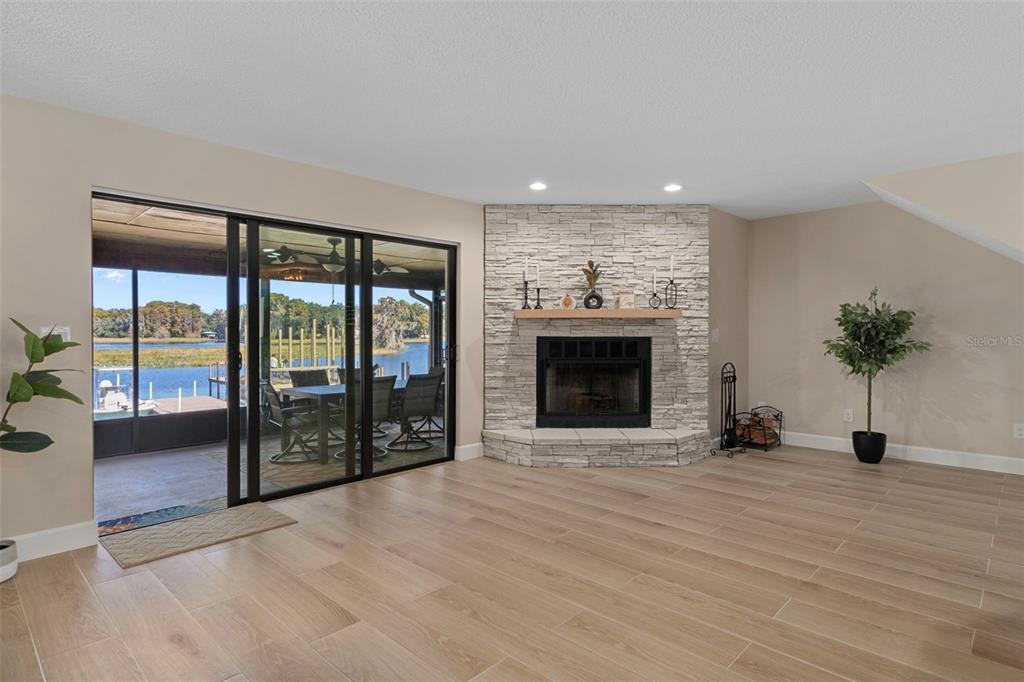 1425 South Homestead Point Inverness, FL 34450 - Photo 16 of 72 a view of an empty room with glass door and a window