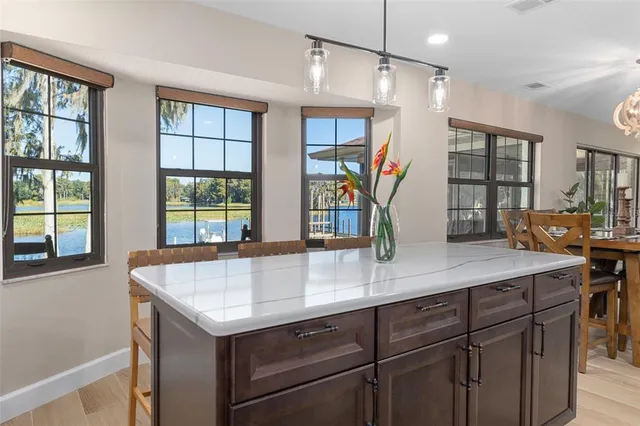 a living room with a baby crib furniture and a window