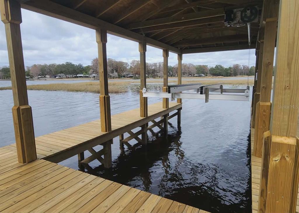 1425 South Homestead Point Inverness, FL 34450 - Photo 47 of 72 a view of a balcony with wooden floor