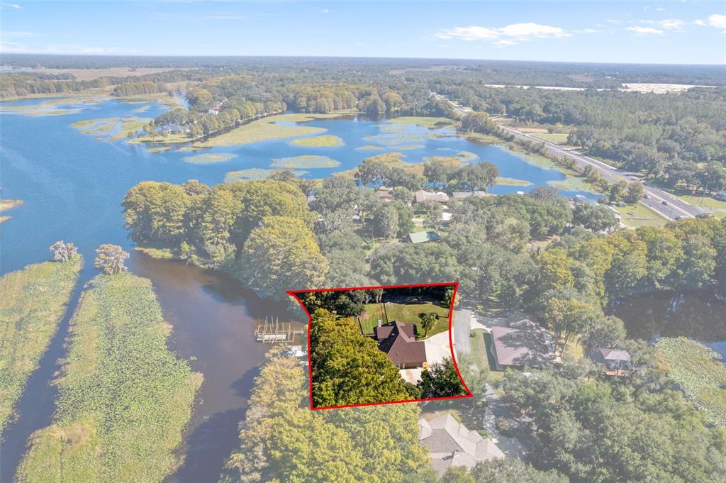 1425 South Homestead Point Inverness, FL 34450 - Photo 67 of 72 an aerial view of a house with outdoor space