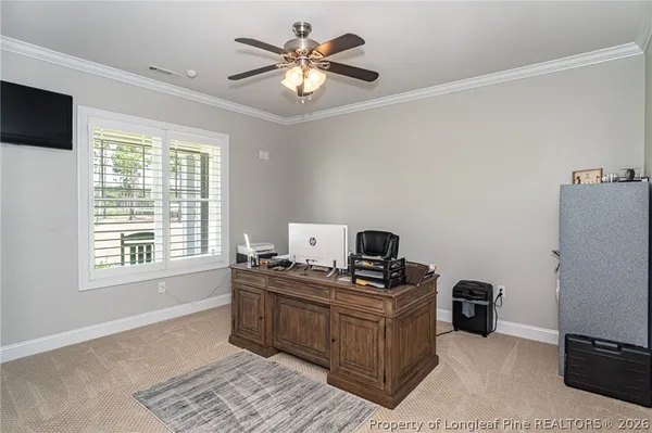 a view of a garage with furniture and a garage