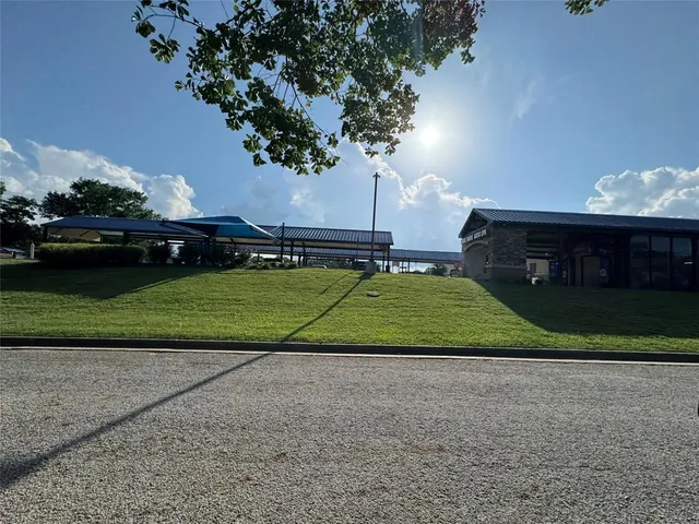 a view of a porch and a yard
