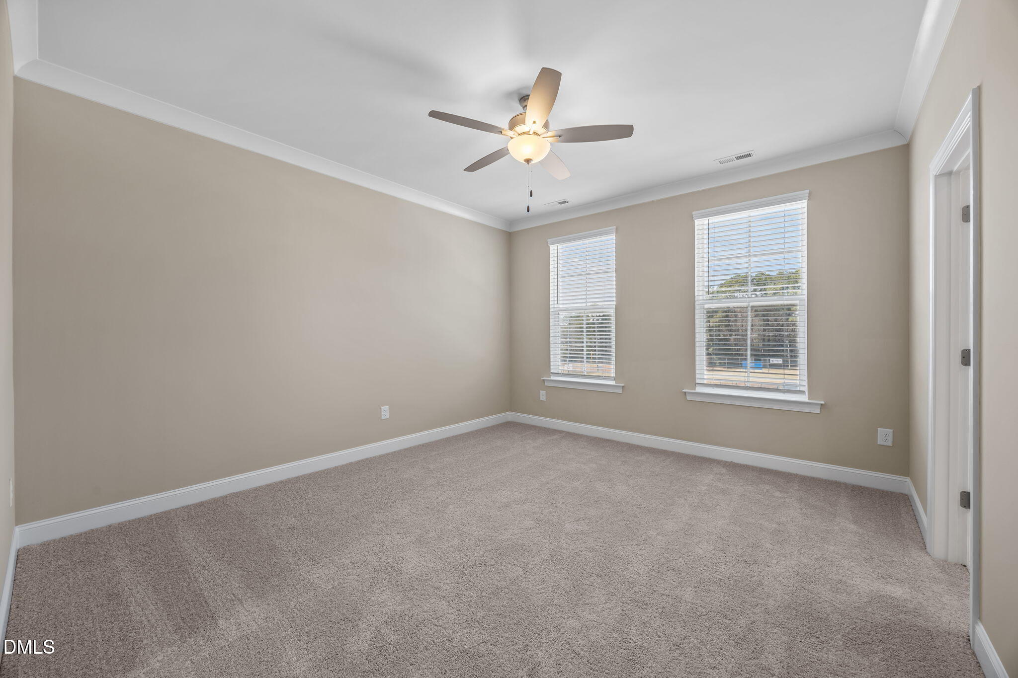 141 Pearl Street, Unit 9 Garner, NC 27529 - Photo 13 of 26 a view of an empty room with a window