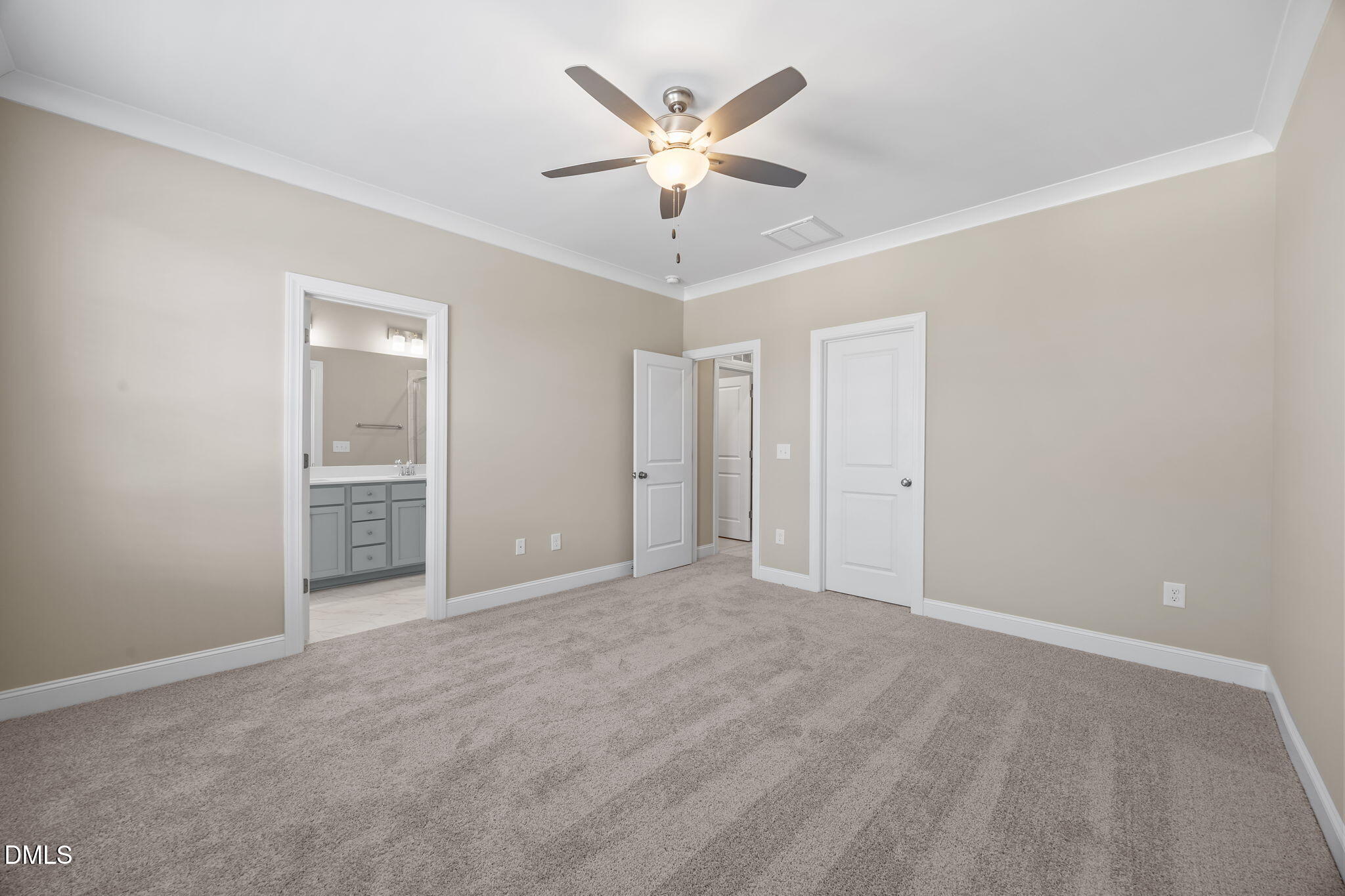 141 Pearl Street, Unit 9 Garner, NC 27529 - Photo 14 of 26 an empty room with closet and fan