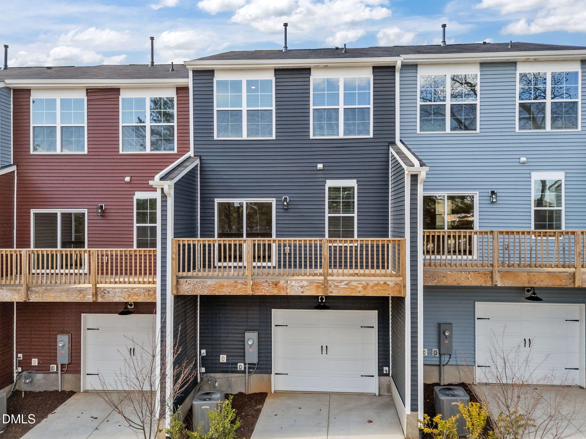 141 Pearl Street, Unit 9 Garner, NC 27529 - Photo 25 of 26 a large building with a lot of windows