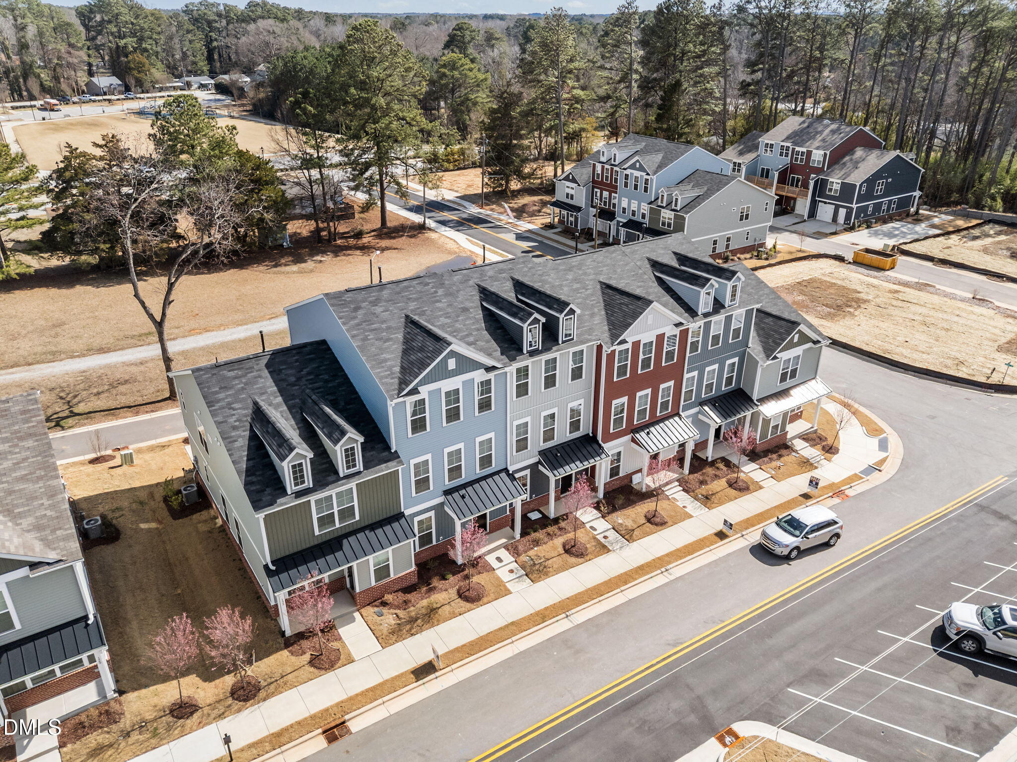 141 Pearl Street, Unit 9 Garner, NC 27529 - Photo 26 of 26 a view of a patio with table and chairs with wooden floor and fence