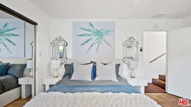 a view of a house with a tree