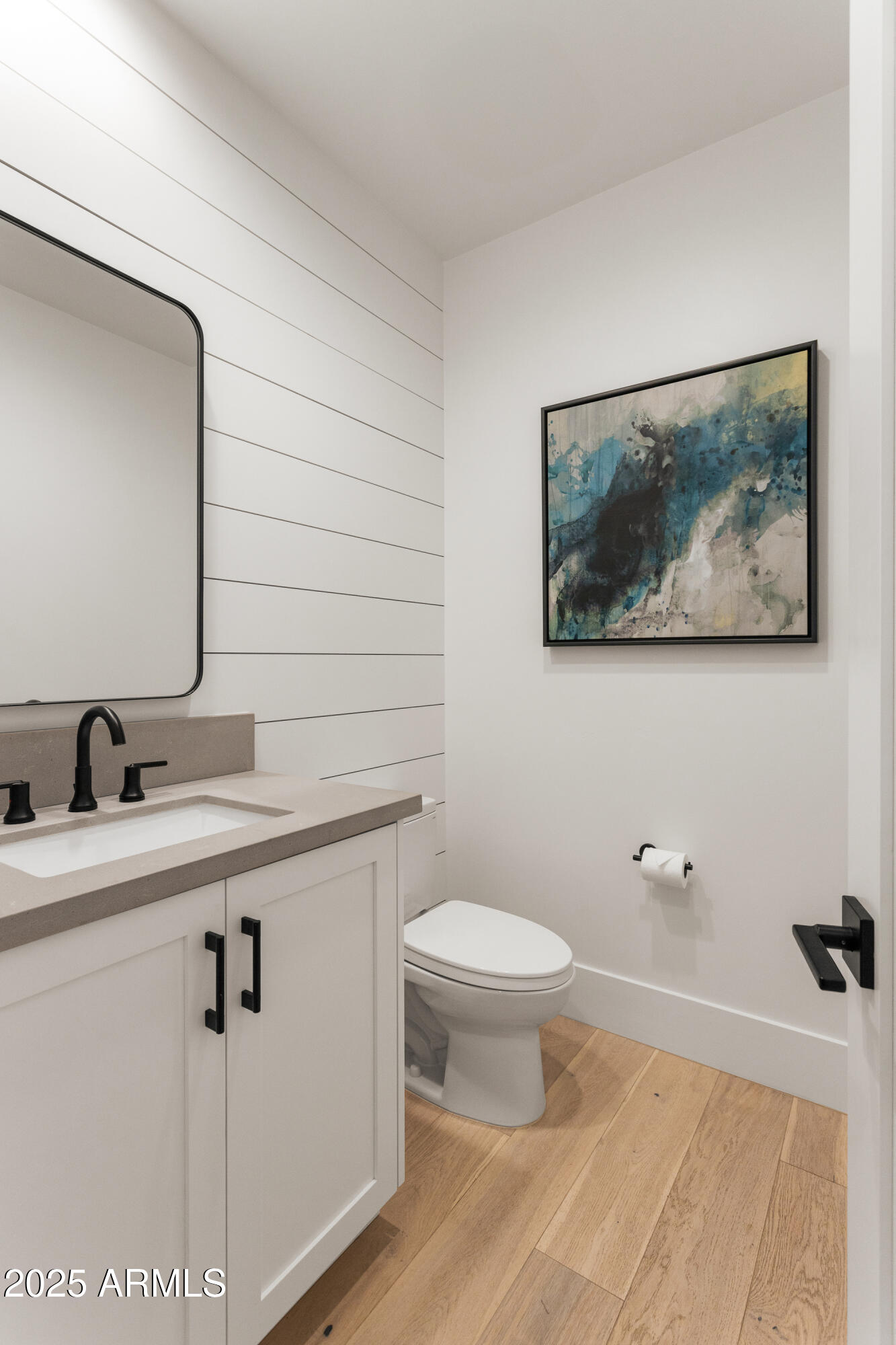 4007 North 34th Street Phoenix, AZ 85018 - Photo 25 of 43 a bathroom with a toilet a sink and mirror