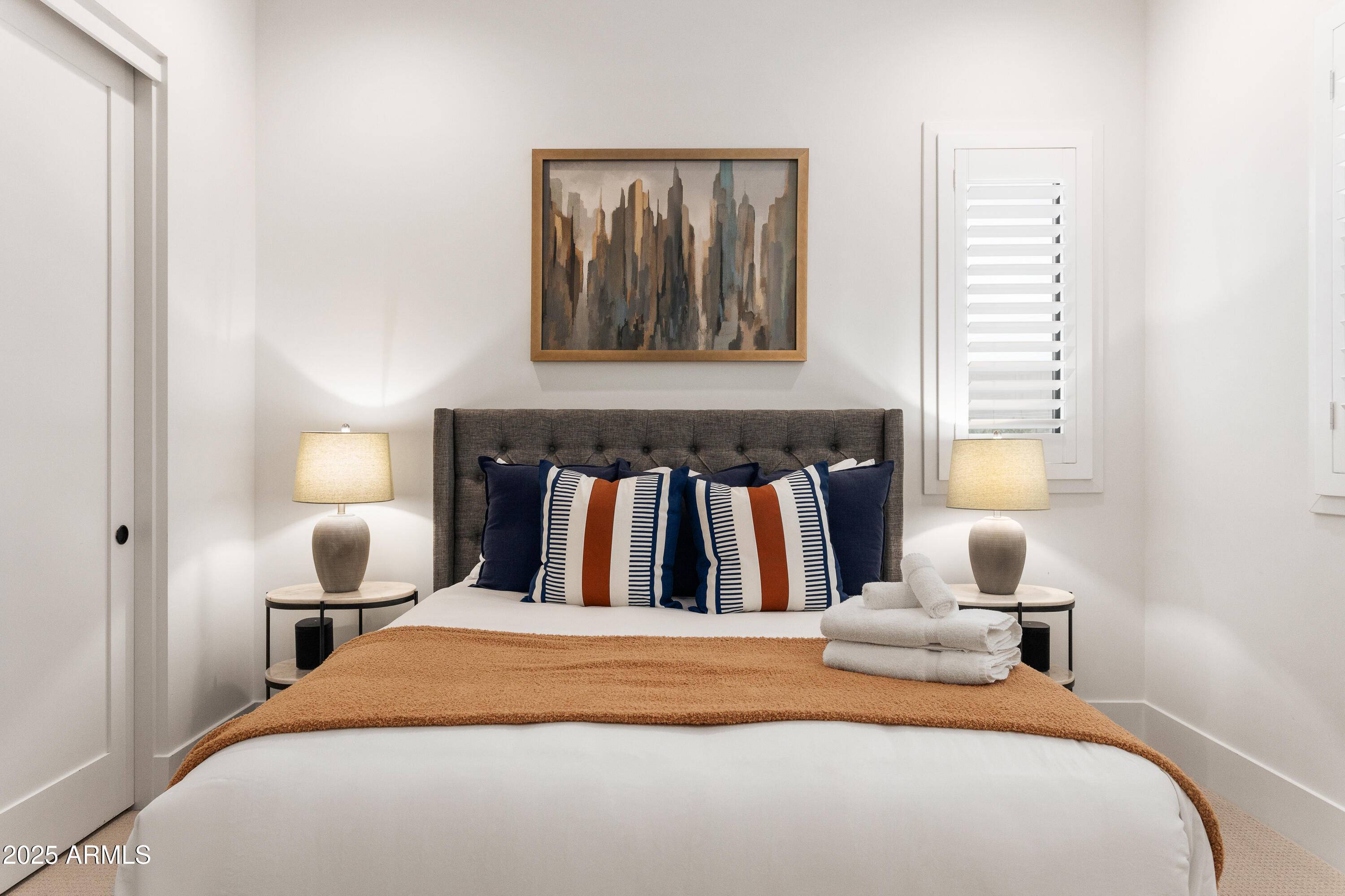 4007 North 34th Street Phoenix, AZ 85018 - Photo 36 of 43 a bedroom with a bed and window