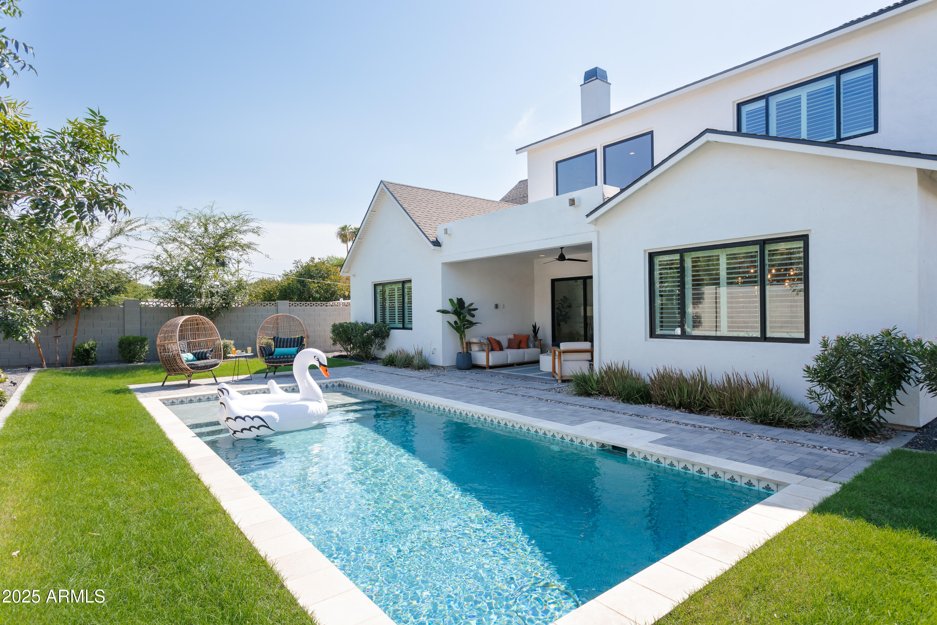 4007 North 34th Street Phoenix, AZ 85018 - Photo 39 of 43 a view of a house with backyard and sitting area