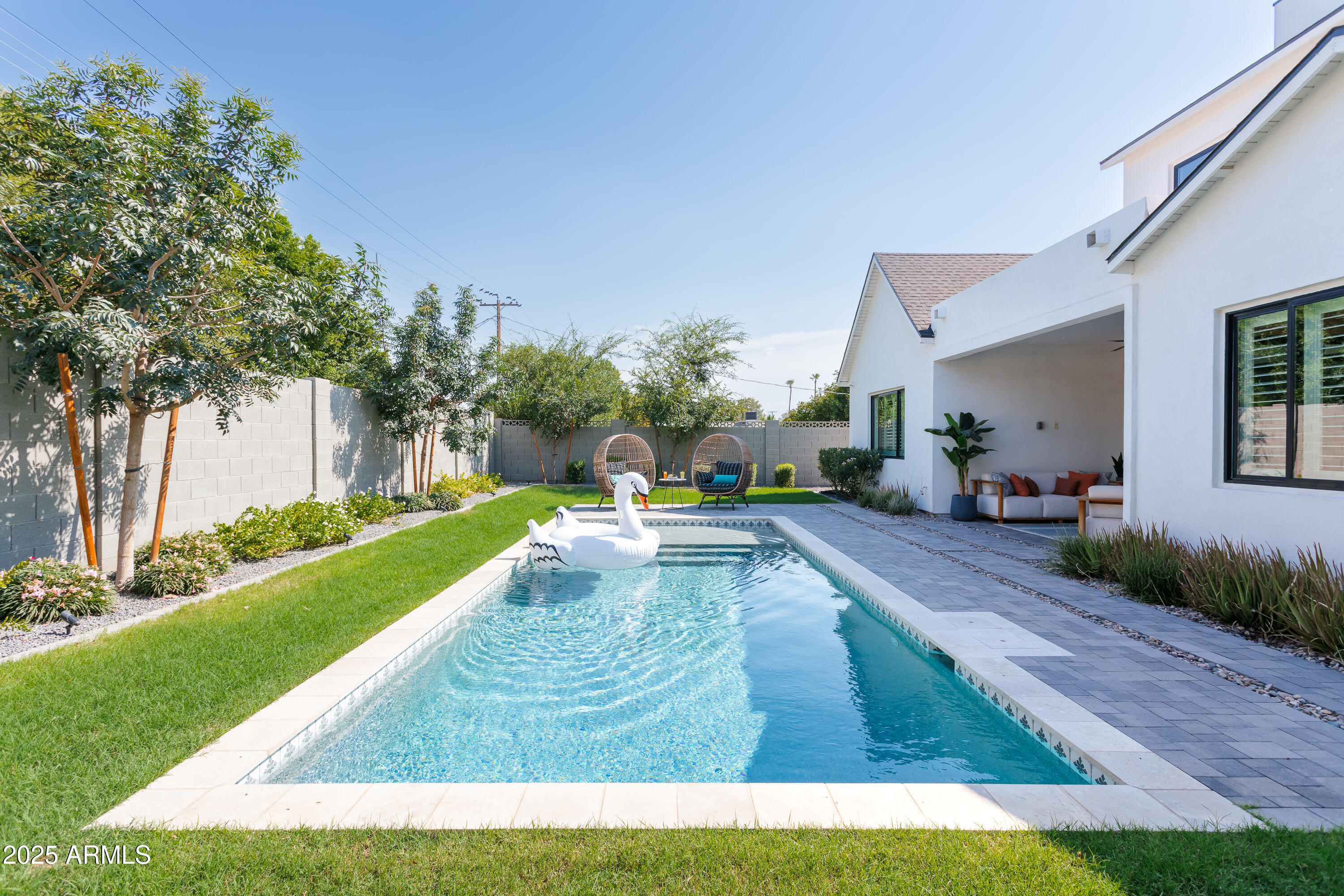 4007 North 34th Street Phoenix, AZ 85018 - Photo 43 of 43 a view of yard with swimming pool and furniture