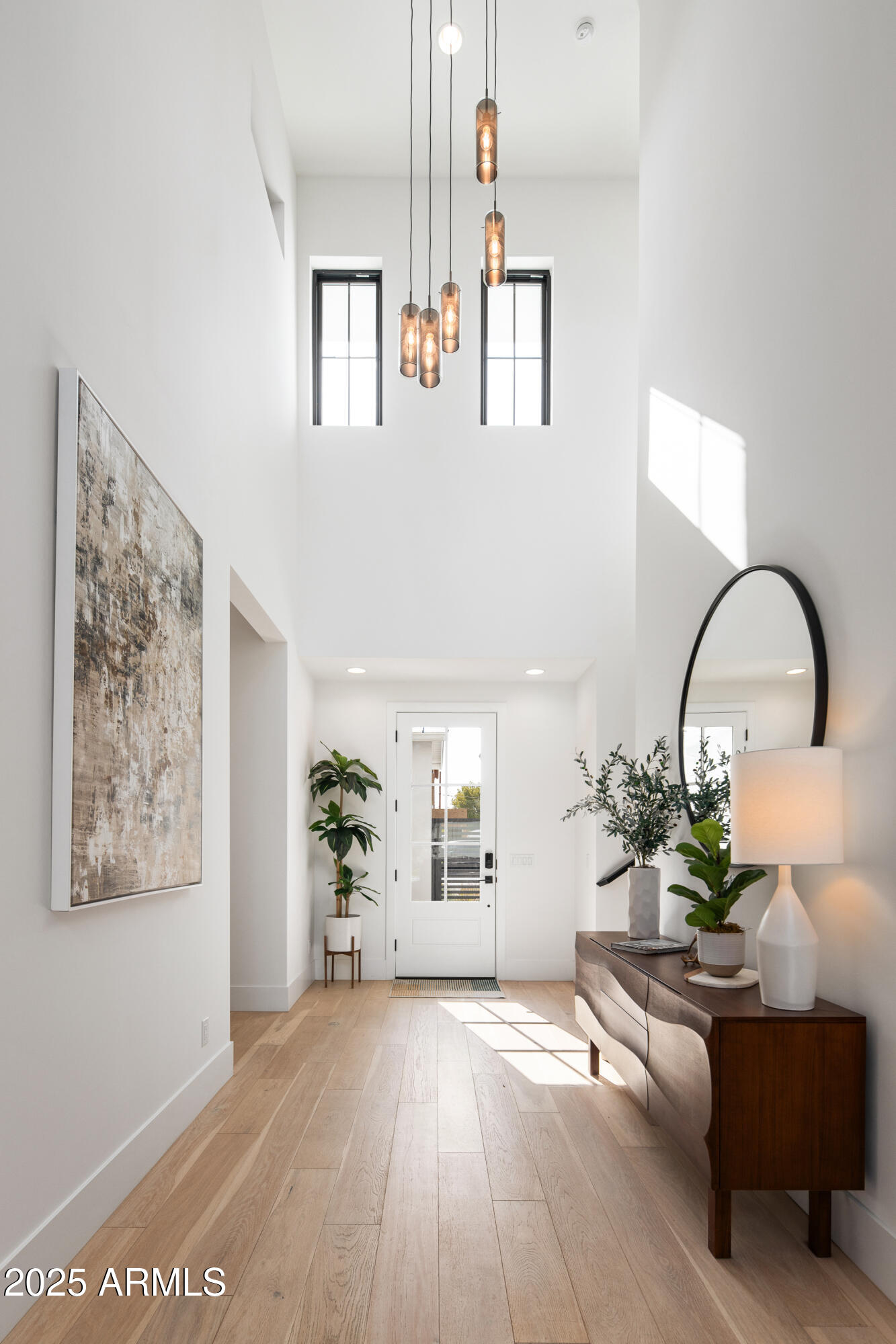 4007 North 34th Street Phoenix, AZ 85018 - Photo 7 of 43 a living room with furniture and wooden floor