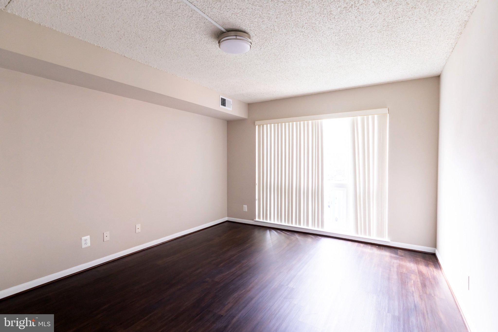 11804 Breton Court, Unit 21 Reston, VA 20191 - Photo 11 of 18 Bright and airy open space awaits.