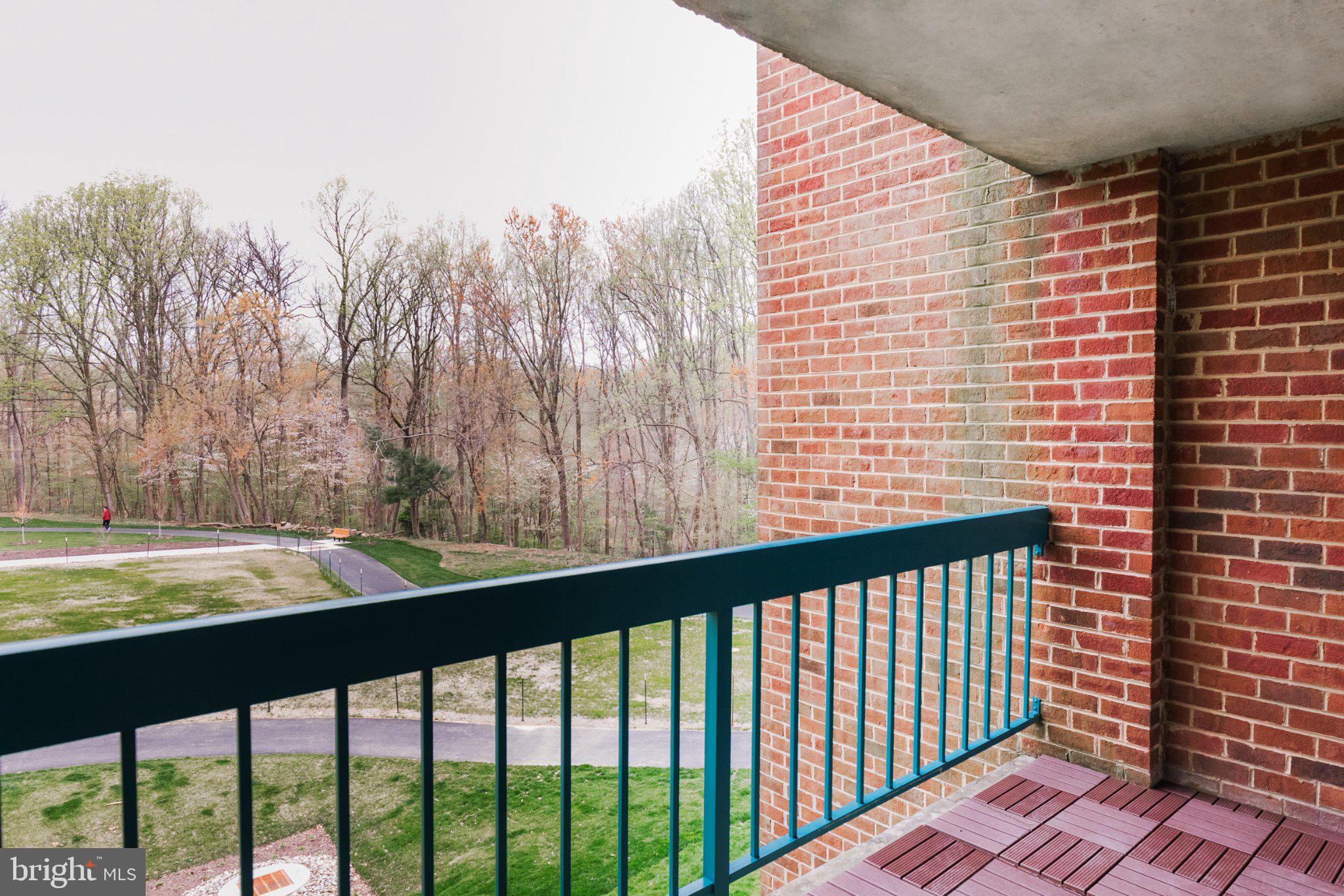 11804 Breton Court, Unit 21 Reston, VA 20191 - Photo 14 of 18 Serene balcony with nature views.