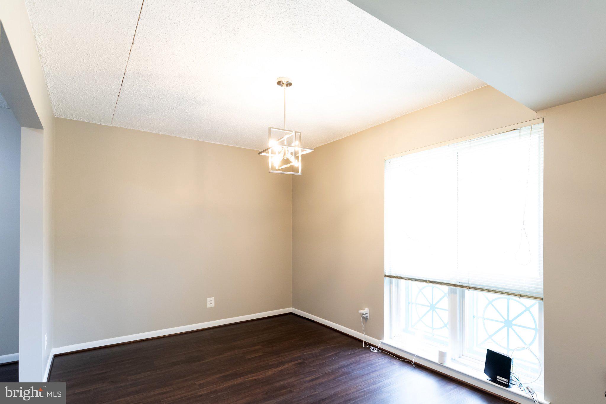 11804 Breton Court, Unit 21 Reston, VA 20191 - Photo 5 of 18 Bright and airy corner space.