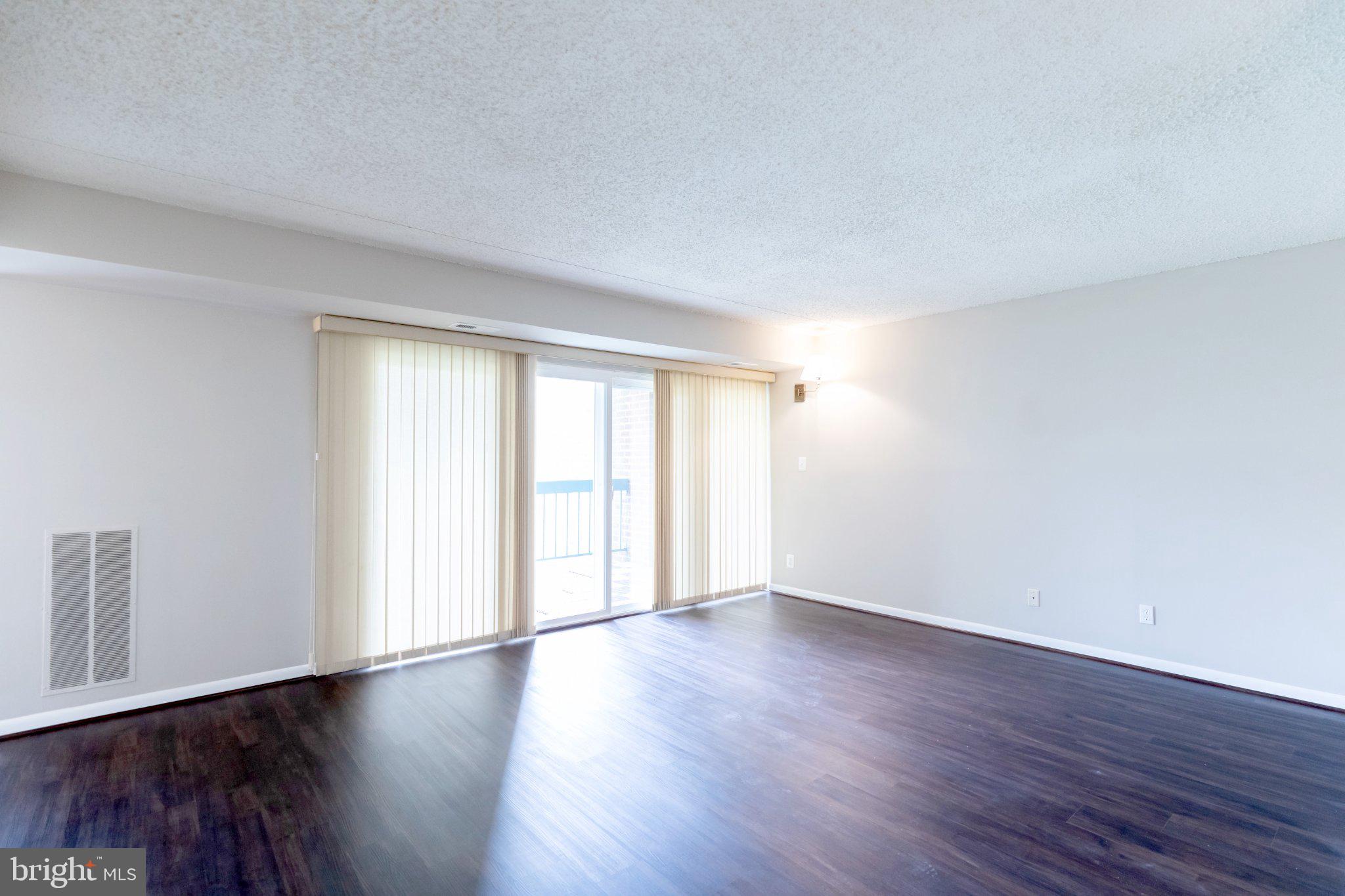 11804 Breton Court, Unit 21 Reston, VA 20191 - Photo 8 of 18 Spacious room with natural light.