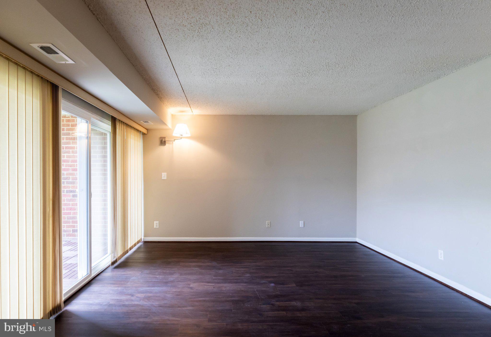 11804 Breton Court, Unit 21 Reston, VA 20191 - Photo 10 of 18 Spacious room with natural light.