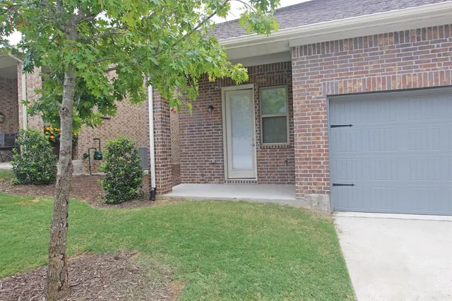 a view of a backyard with a garden