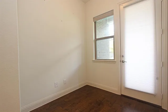 an empty room with window
