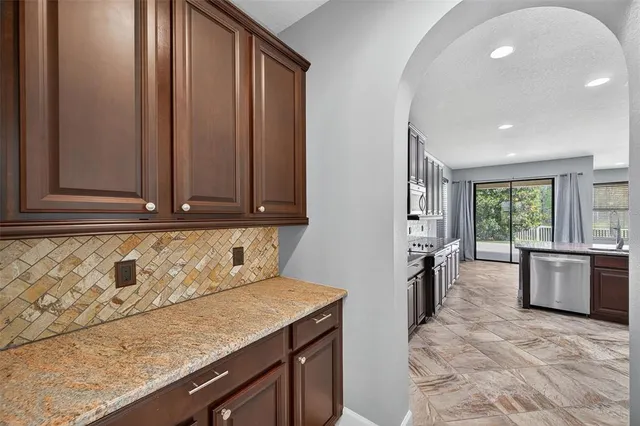 a view of a storage and utility room with a window