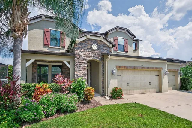 front view of a house with a garden