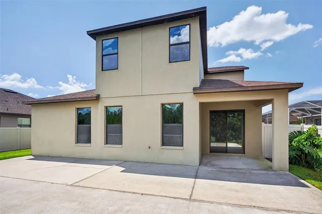 a front view of a house with a garage