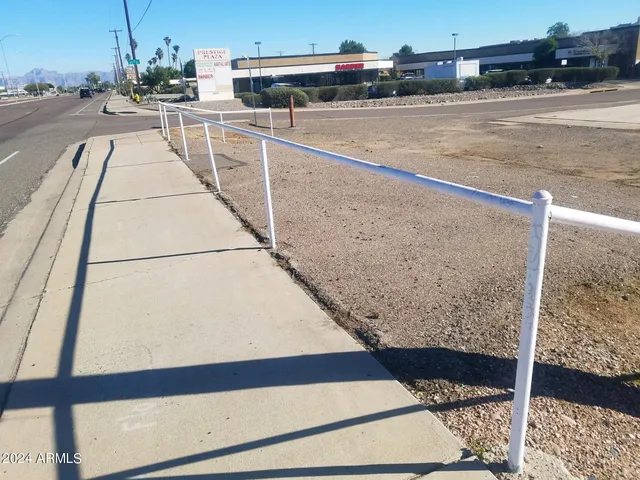 a view of a balcony with city view
