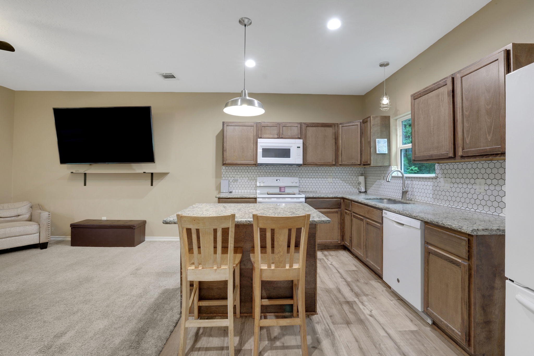 97 Harrell Road Coldspring, TX 77331 - Photo 10 of 31 You can cook and still spend time with the family