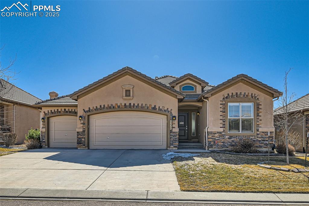 2553 Cinnabar Road Colorado Springs, CO 80921 - Photo 1 of 27 a view of front of house with a street