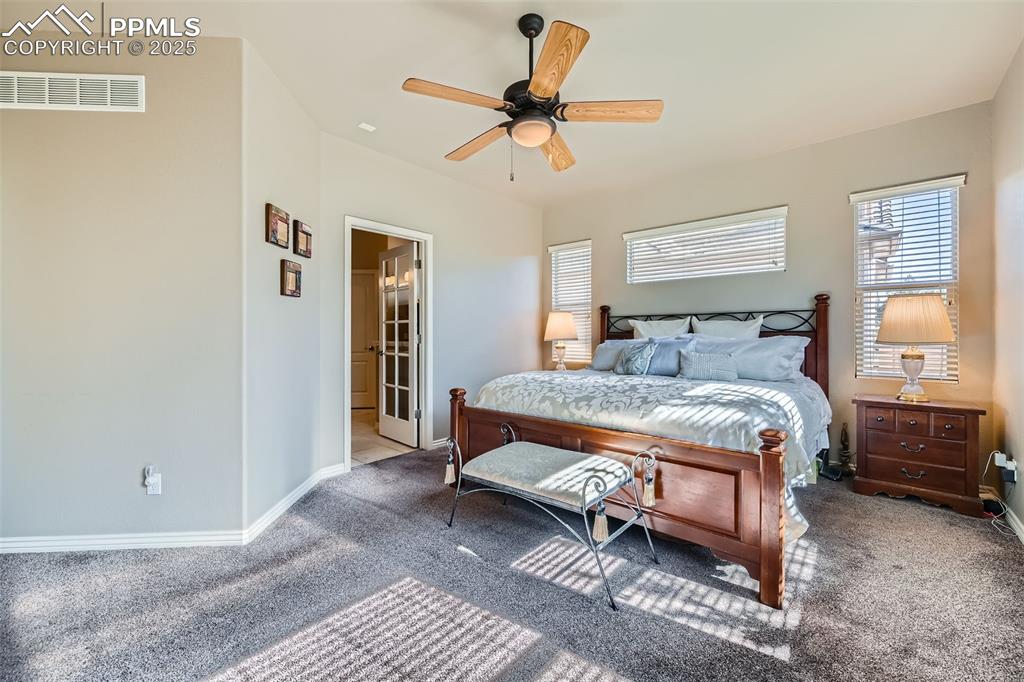 2553 Cinnabar Road Colorado Springs, CO 80921 - Photo 14 of 27 a bedroom with a bed and window