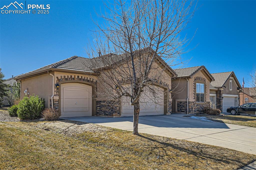2553 Cinnabar Road Colorado Springs, CO 80921 - Photo 2 of 27 a house view with a outdoor space