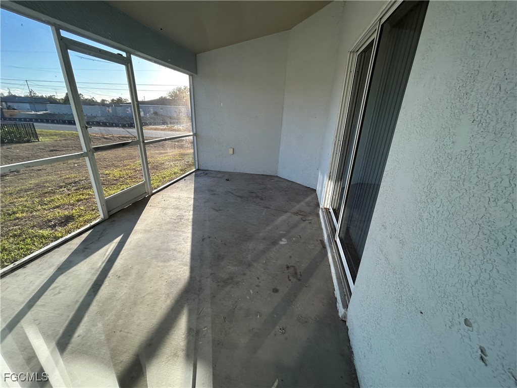 3719 32nd Street Southwest Lehigh Acres, FL 33976 - Photo 15 of 15 a view of a floor to ceiling window