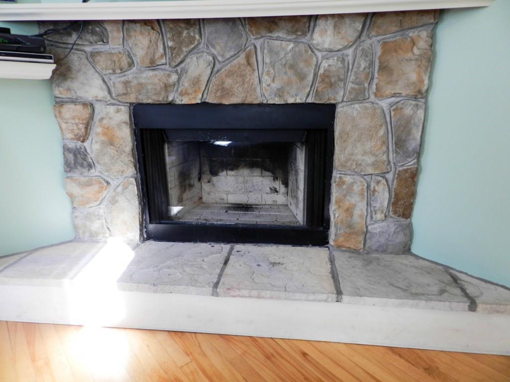 21 Sea Road Kennebunk, ME 04043 - Photo 6 of 31 Beautiful wood burning fireplace.