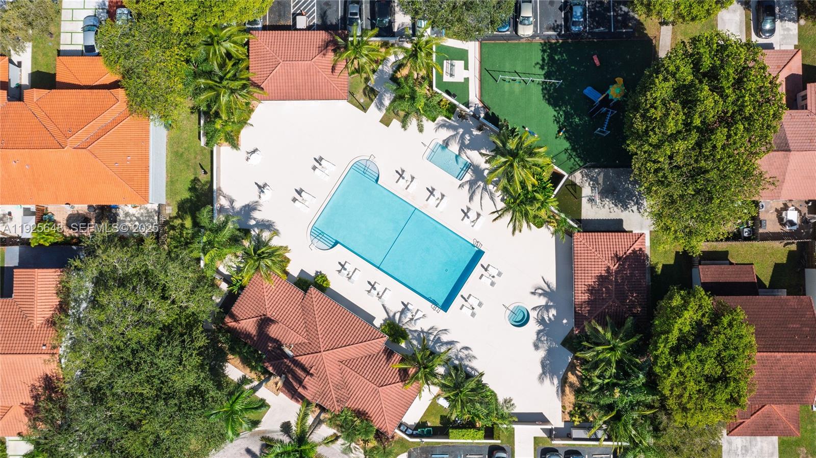 an aerial view of a house with a garden