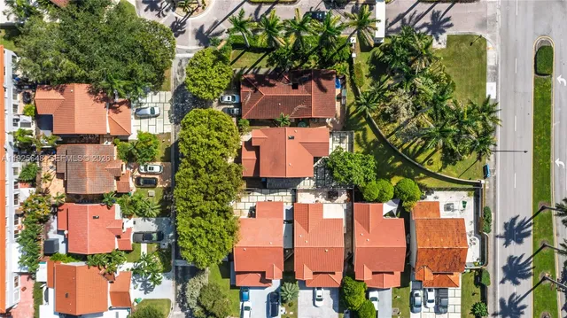 a swimming pool with outdoor seating and yard