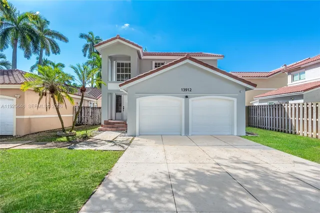 a house with trees in front of it