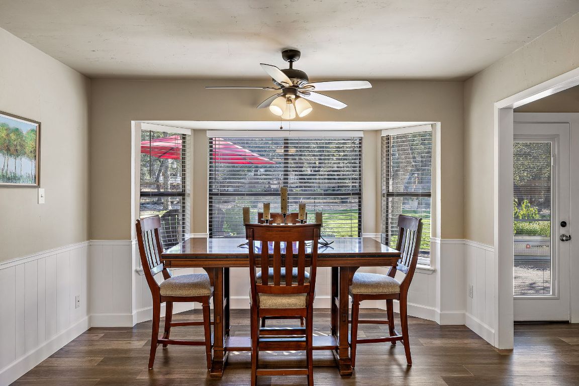 4203 Azul Court Georgetown, TX 78628 - Photo 22 of 38 a view of a dining room with furniture window and wooden floor