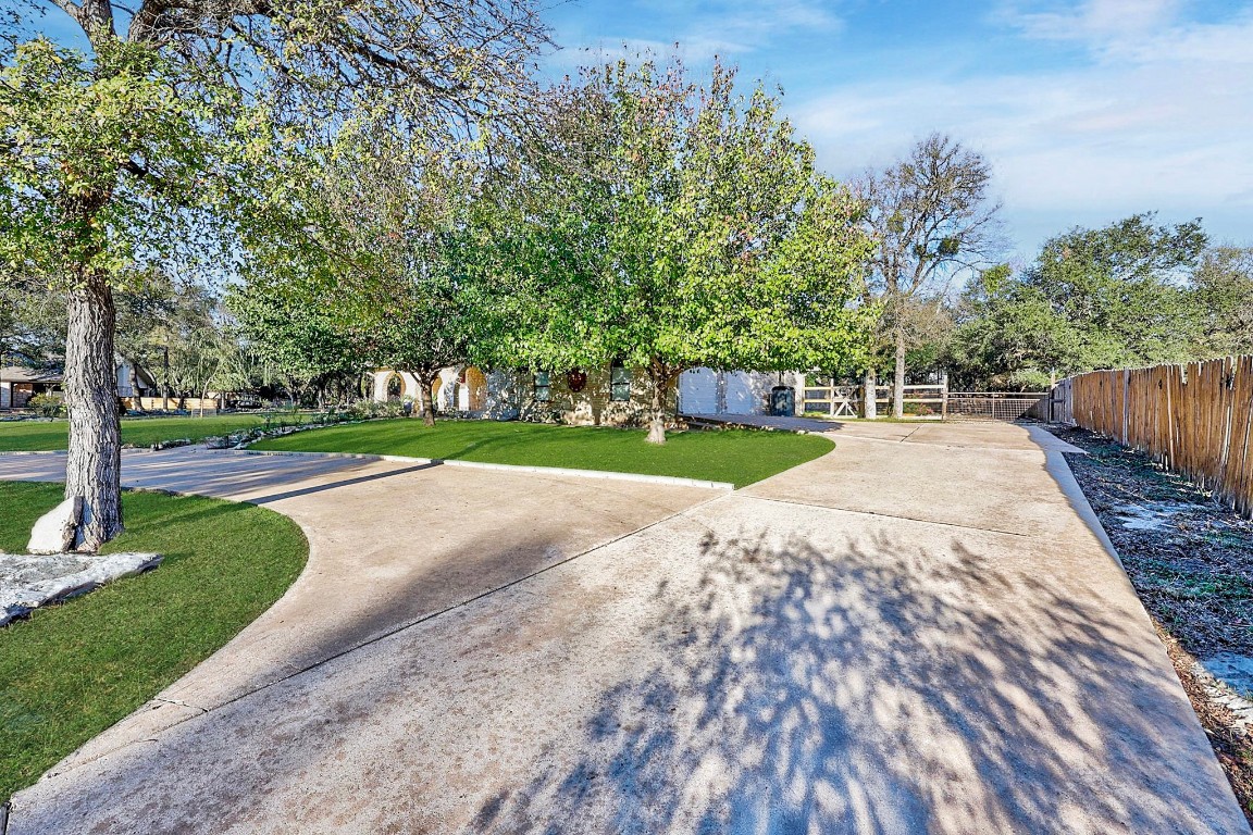 4203 Azul Court Georgetown, TX 78628 - Photo 35 of 38 a view of a backyard with a garden