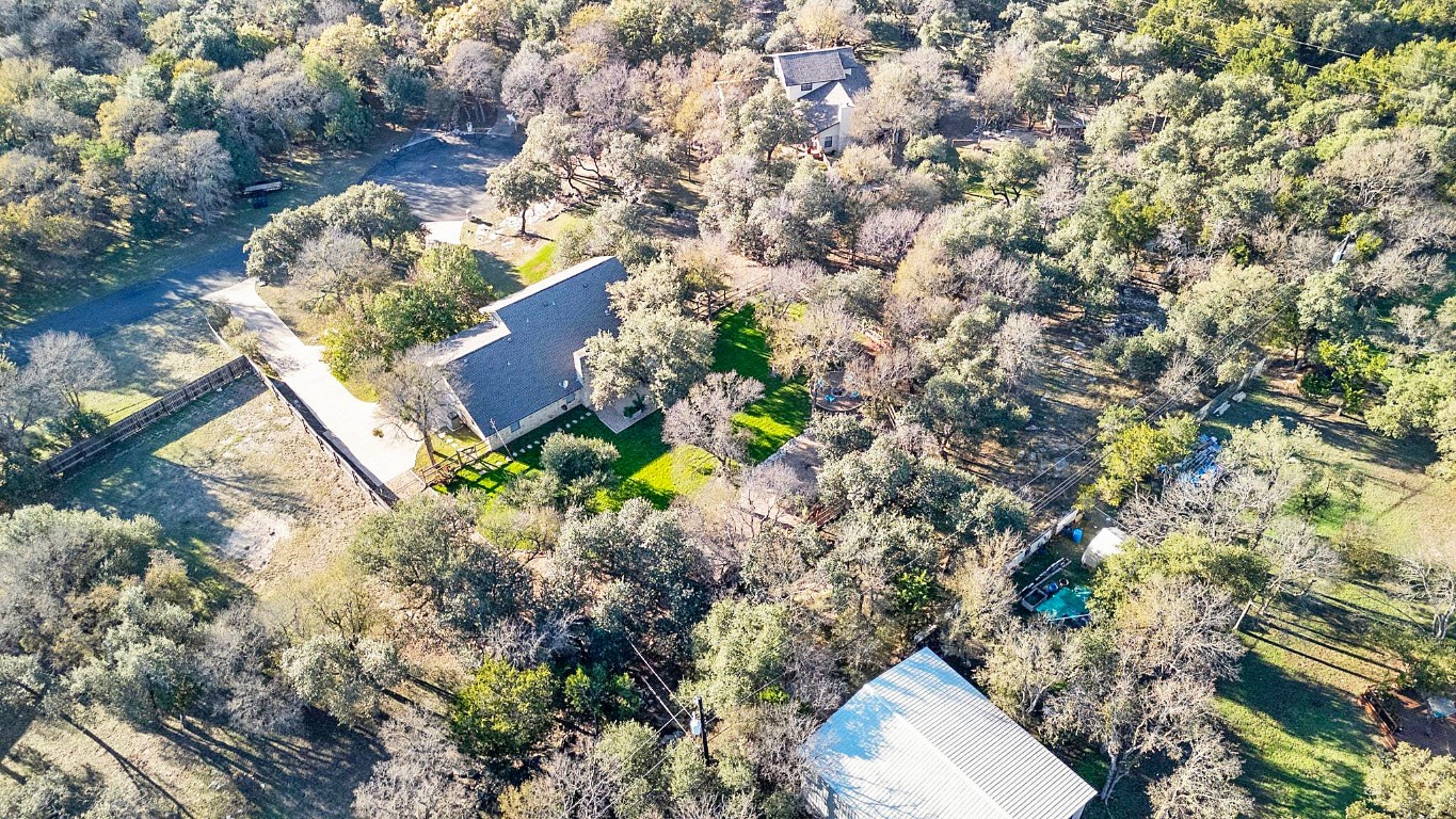 4203 Azul Court Georgetown, TX 78628 - Photo 38 of 38 an aerial view of a house with a yard and a lake view